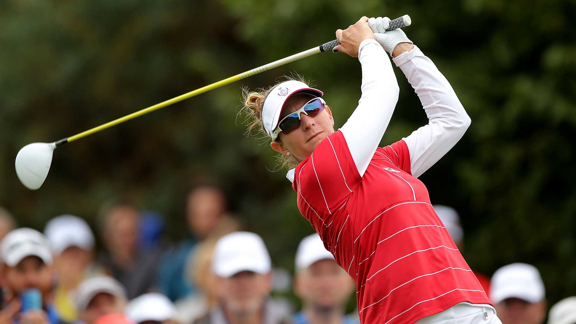 Brittany Lang of the United States Team plays a shot during the afternoon fourball matches on day one of the Solheim Cup 2015